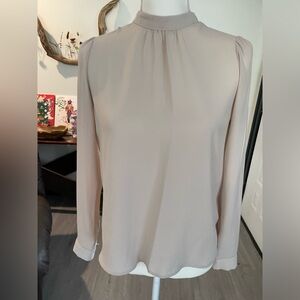 High neck cream blouse